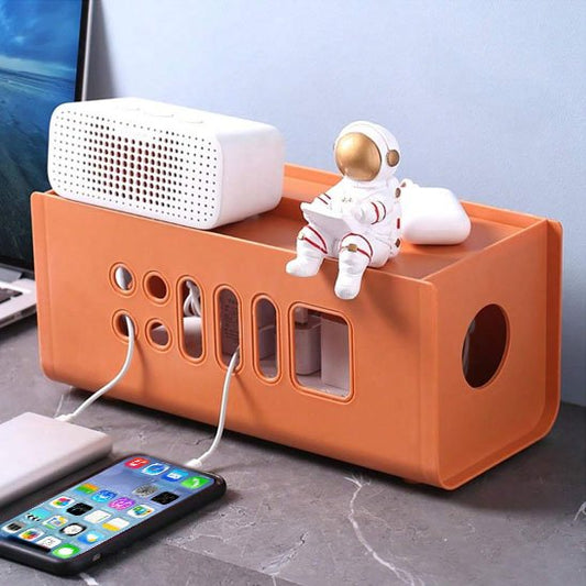 cache pour cable originale orange décoratif sur bureau