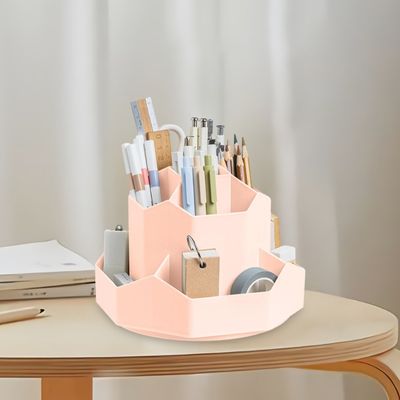 organisateur de bureau rose plein fournitures sur table rotatifetdesign
