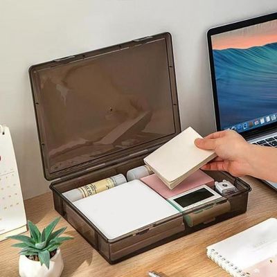 rangement bureau main prend post-it portable calendrier