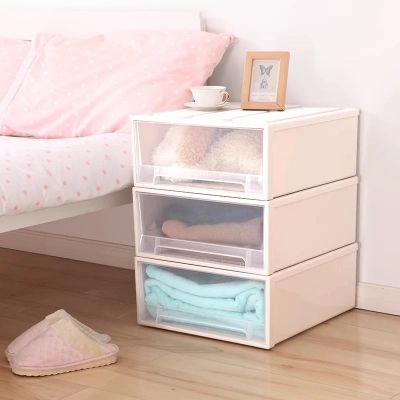 tour de rangement en plastique côté lit pantoufles