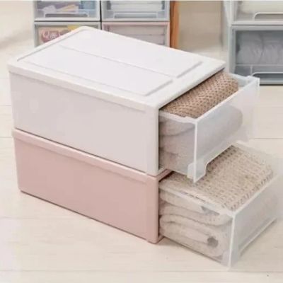 tour de rangement en plastique 2 tiroirs ouverts serviettes dedans