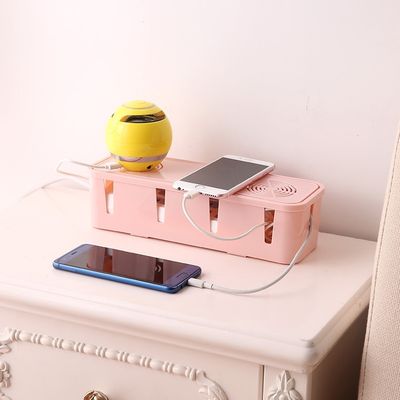 cache cable telephone rose 2 cellulaires sur table nuit