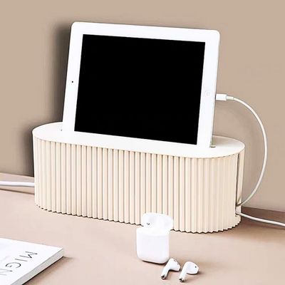 cache pour fil electrique beige Ipad dessus écouteurs ouverte