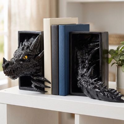 cale livre en forme de dragon sortant caverne soutient livres