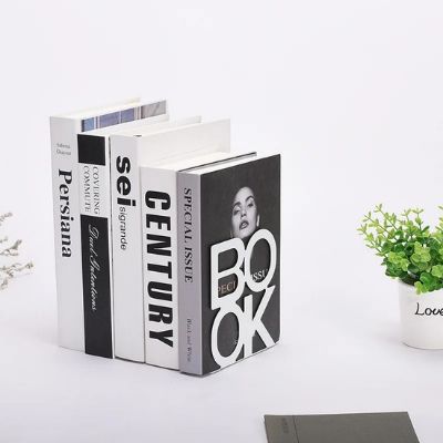 cale livres book design table blanche plante