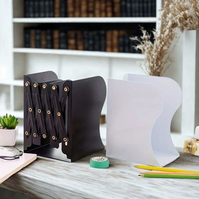 cale pour livre extensible bibliotheque et plante derriere crayons livres