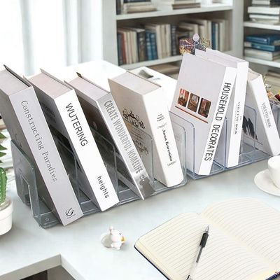 cale pour livre transparent tenant livres sur bureau