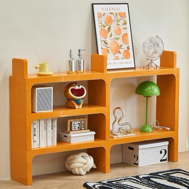 Étagère bureau orange avec décoration lampe boîte cadre