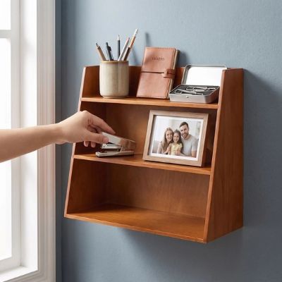 etagere pour bureau main tendu prend brocheuse