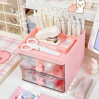 organisateur de bureau rose ciseau agrafeuse crayons