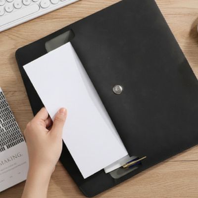 porte document cuir noir ouvert papier maint