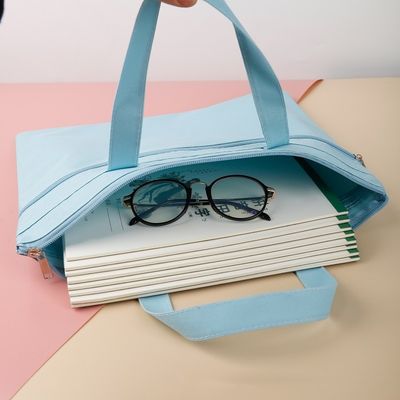 porte document ouvert cahiers lunettes