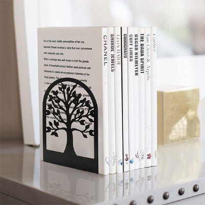 serre livre metal noir sur meuble