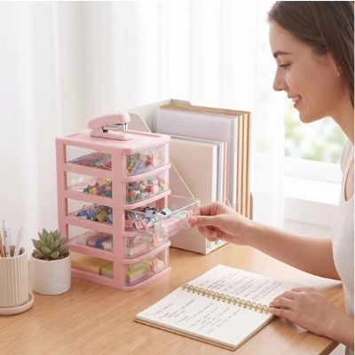 tour de rangement en plastique dame souriante ouvre tiroir cahier