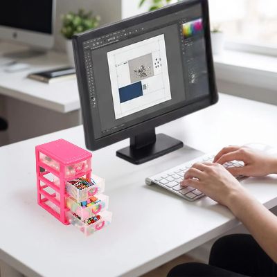 tour de rangement en plastique sur bureau main tape clavier
