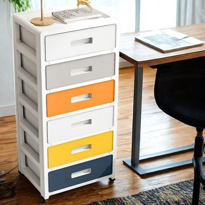 tour de rangement plastique côté bureau fenêtre livre