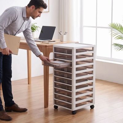 tour de rangements plastique homme prend document tiroir
